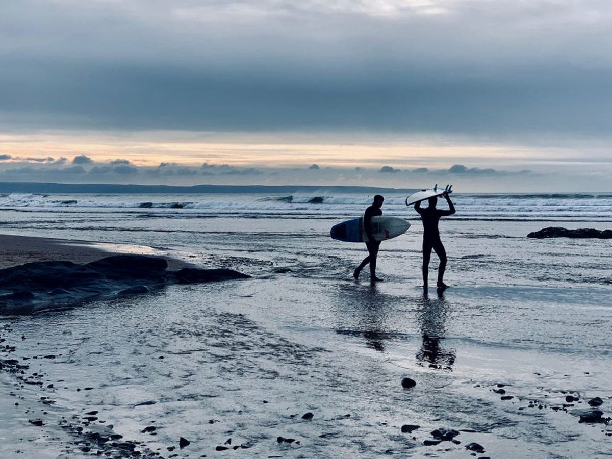 Surfers at Croyde on the north coast