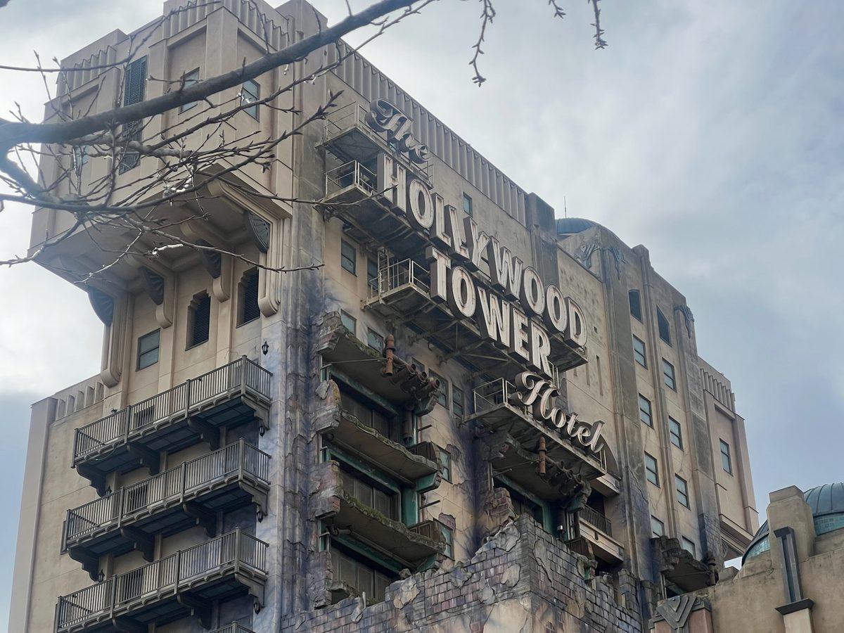 The tall brick Hollywood Tower Hotel that houses the Tower of Terror in World Premiere Plaza