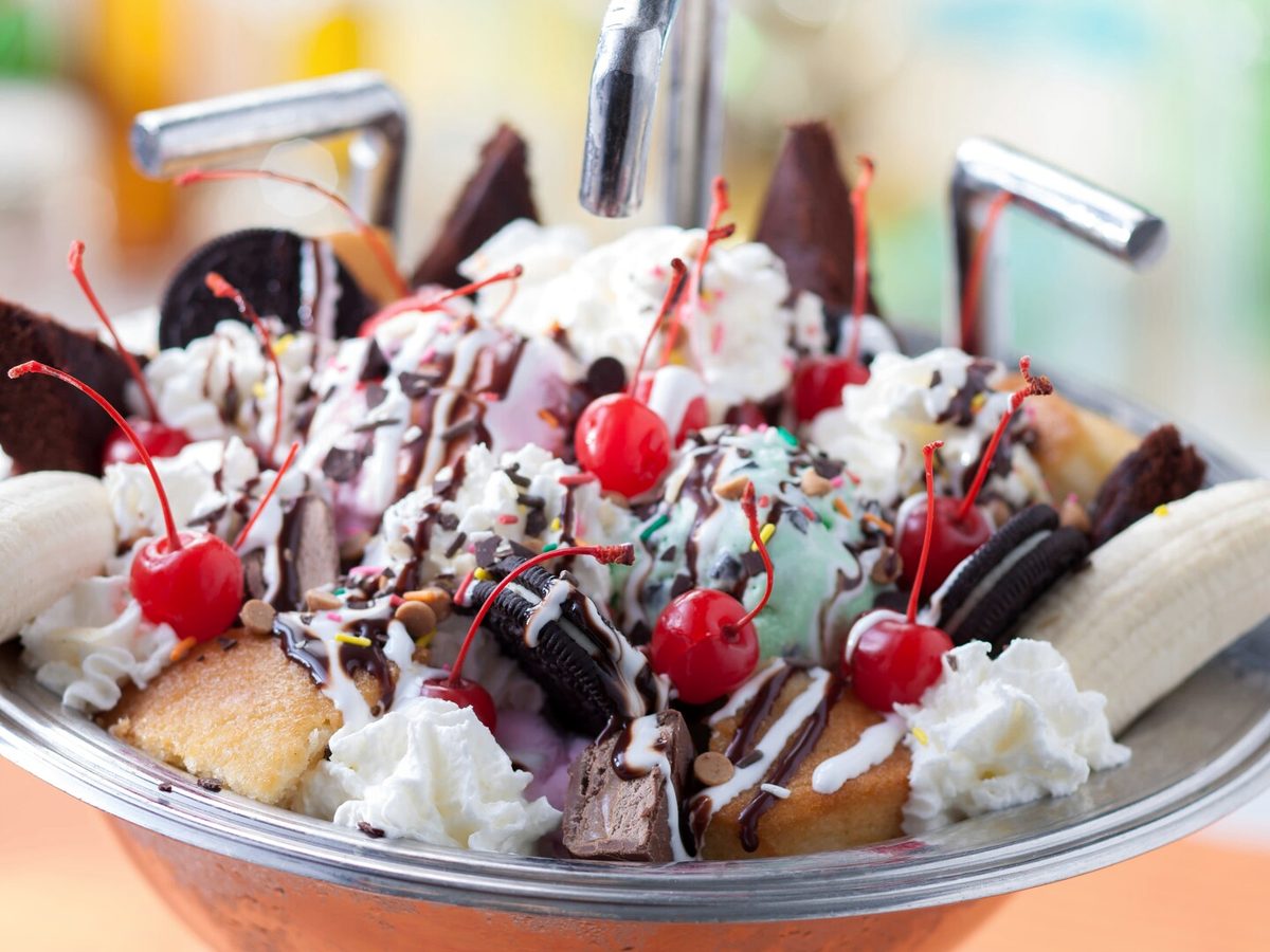 The Kitchen Sink at Beaches & Cream, a metal sink piled with ice cream, whipped cream, cherries, banana and biscuits