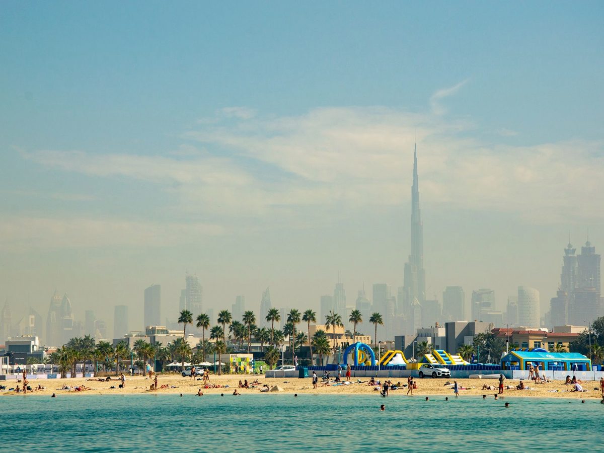 A Dubai beach with the Downtown skyline behind