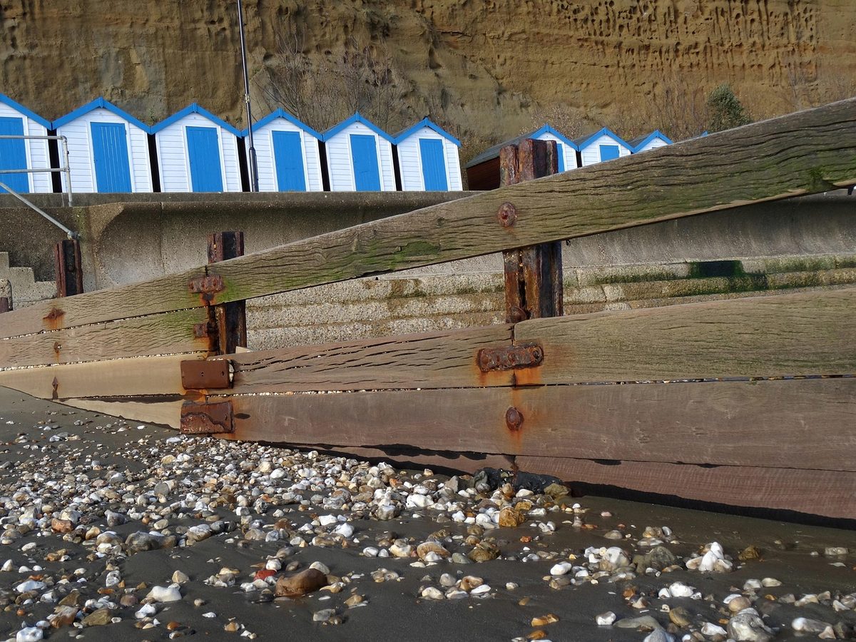 Beach huts above the sand