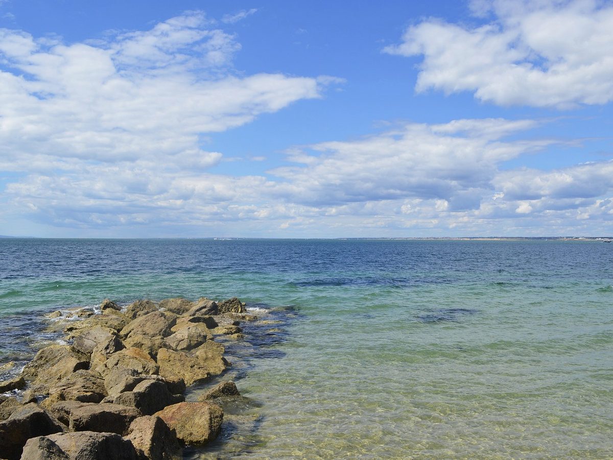 Clear shallow water off the island