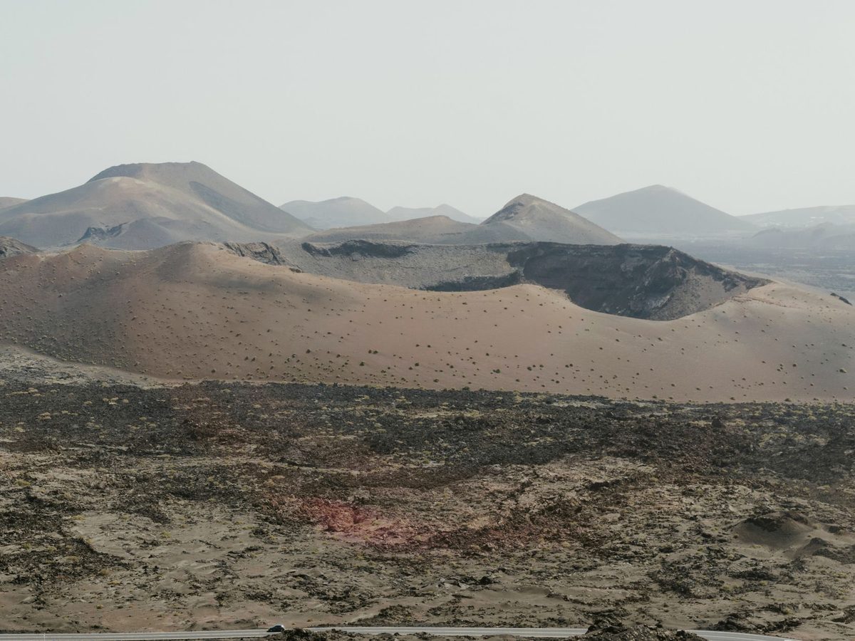 Rust-red volcanic cones in Timanfaya National Park