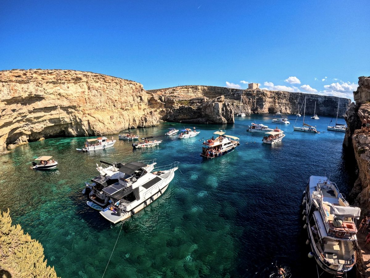 Boats at the Blue Lagoon between Comino and Cominotto