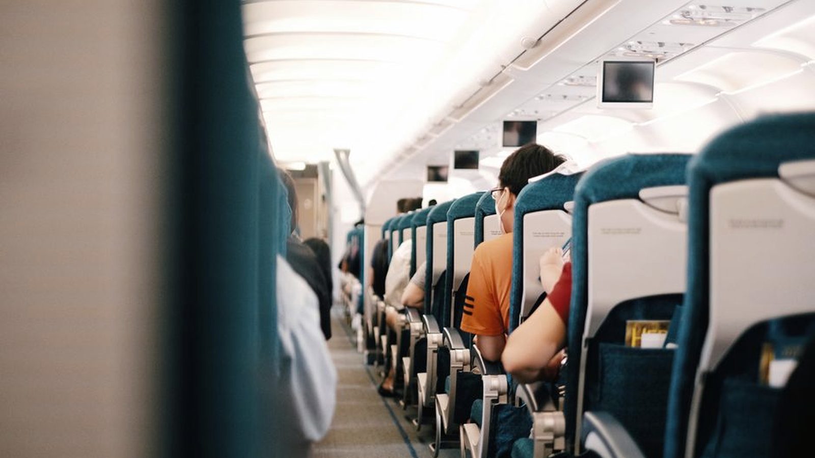 Cabin bags stowed in an aircraft overhead locker