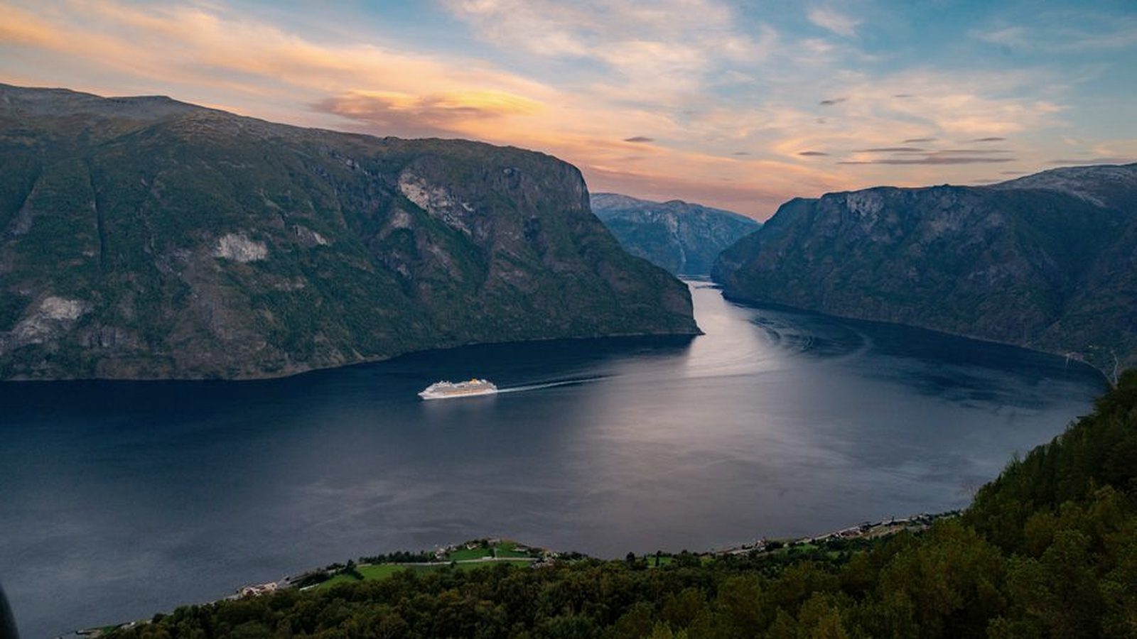 A cruise ship in a Norwegian fjord