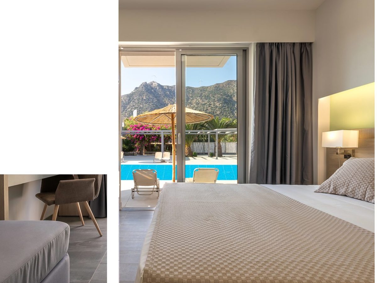 A ground-floor room with a large bed and sliding glass doors opening onto a terrace beside a pool, with a mountain view beyond.