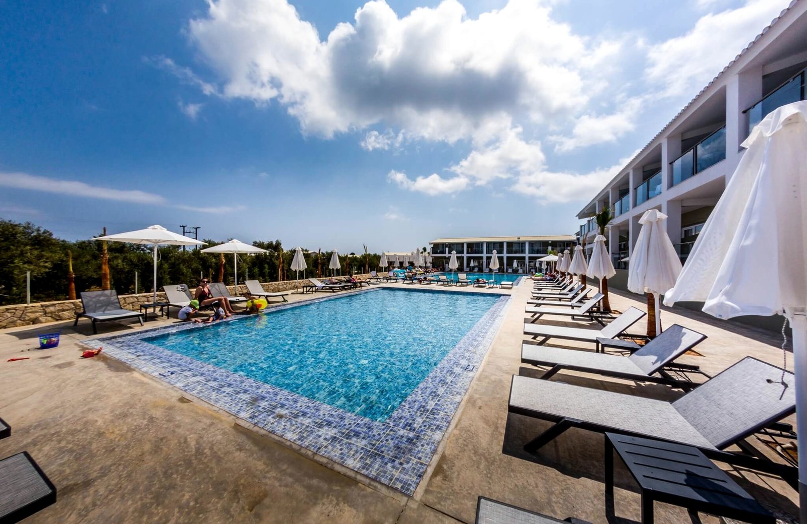 Caretta Beach Resort & WaterPark at Kalamaki on Zante: low-rise buildings around the pools and waterpark.