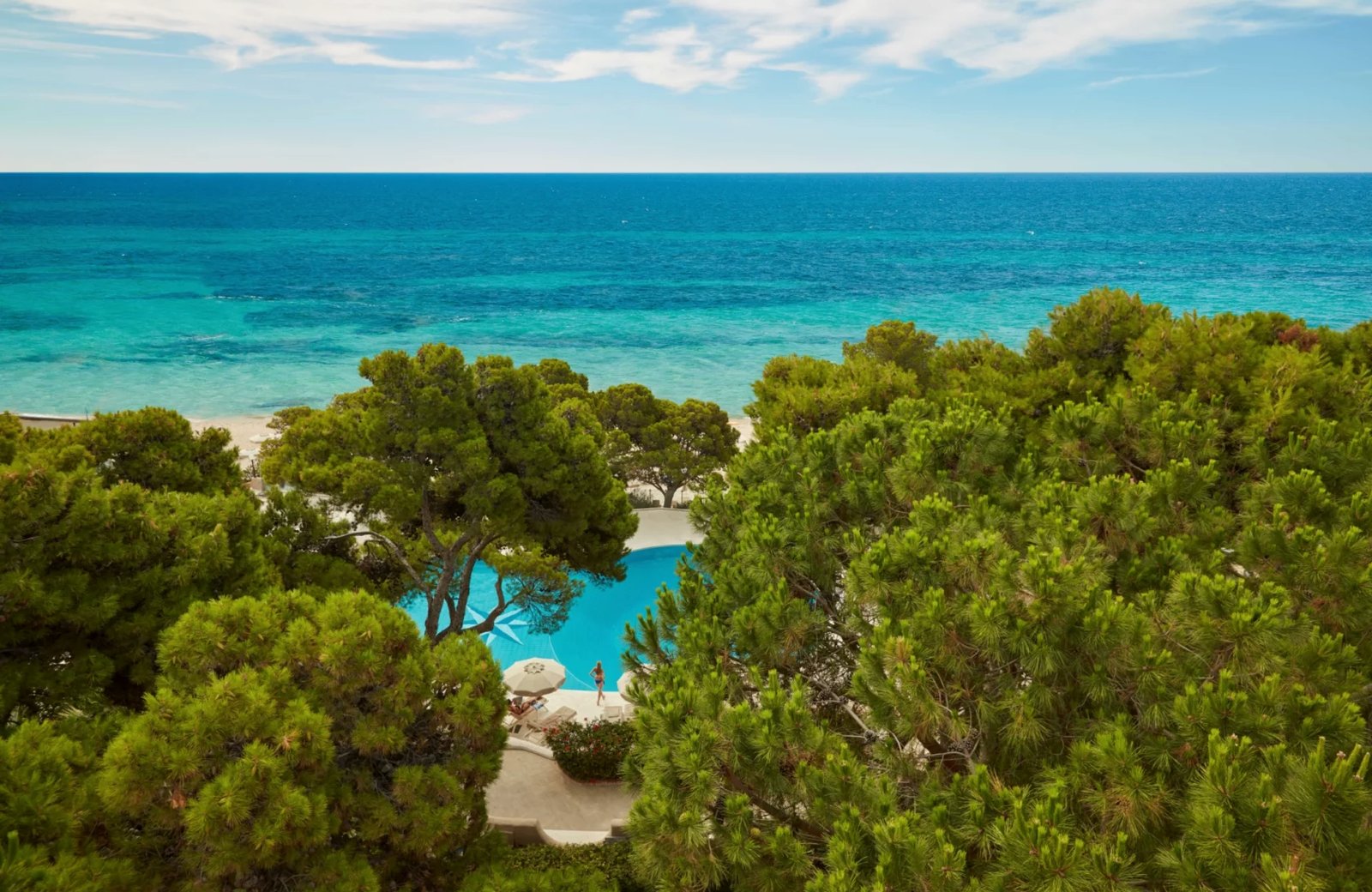 Forte Village resort on the south coast of Sardinia, with white-sand beach, pools and gardens.