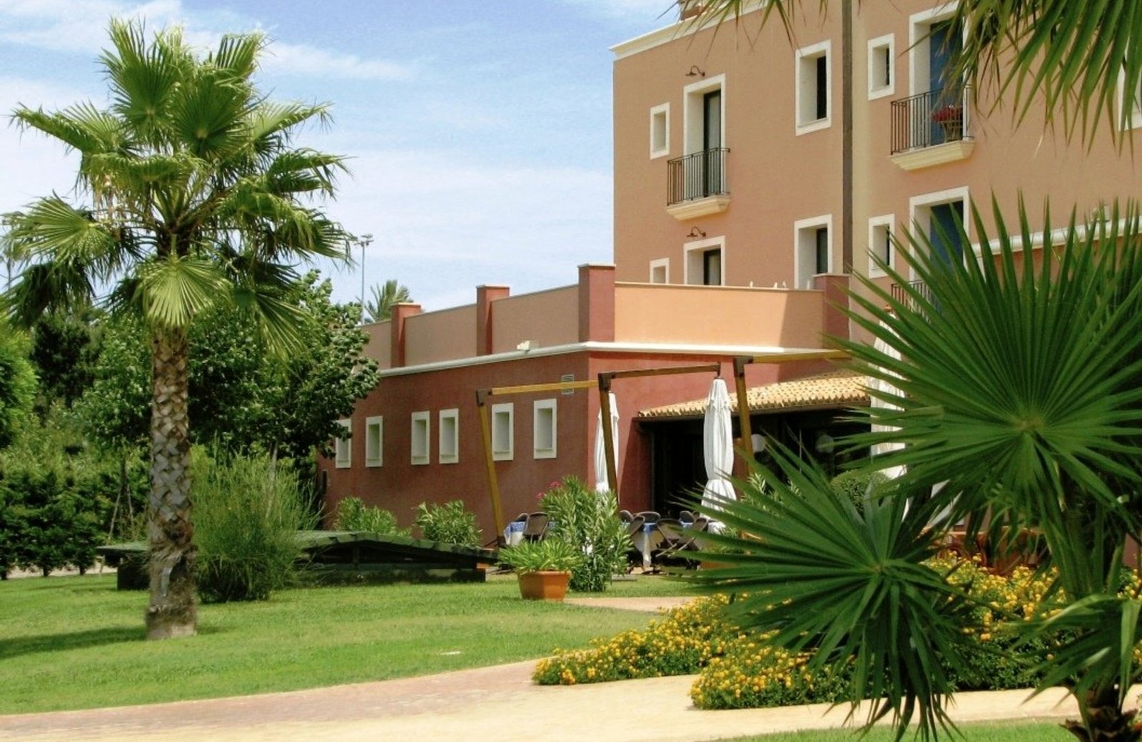IGV Club Baia Samuele, a low-rise Italian holiday village in landscaped grounds behind a fine-sand beach on Sicily's south coast.