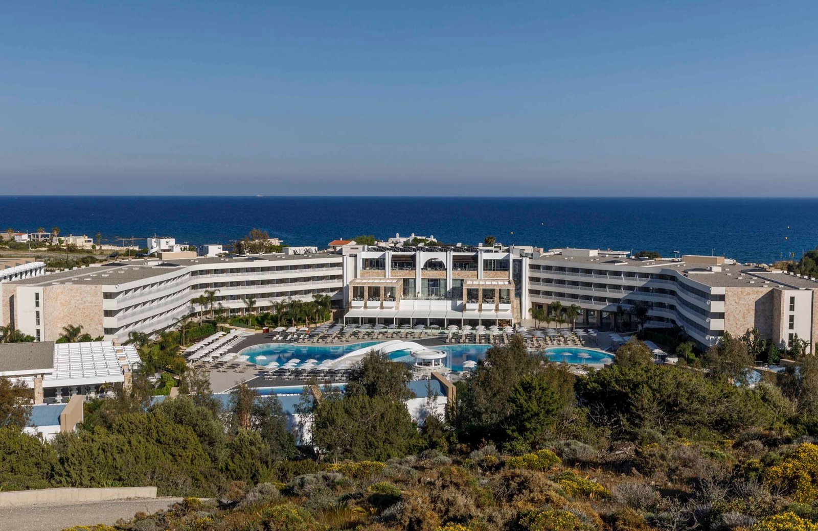 Princess Andriana Resort & Spa at Kiotari on the southeast coast of Rhodes, its pools and buildings above the sea.