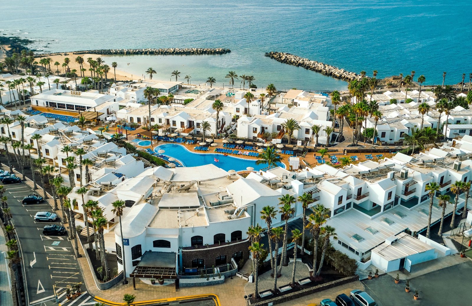 TUI BLUE Flamingo Beach, a low-rise bungalow-style aparthotel behind the sandy, breakwater-sheltered Playa Flamingo beach at Playa Blanca in southern Lanzarote.