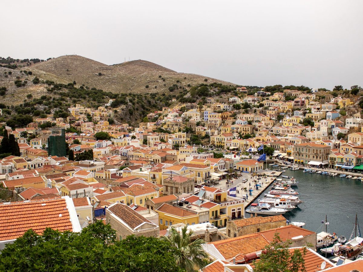 Symi harbour, the houses stacked above the moorings