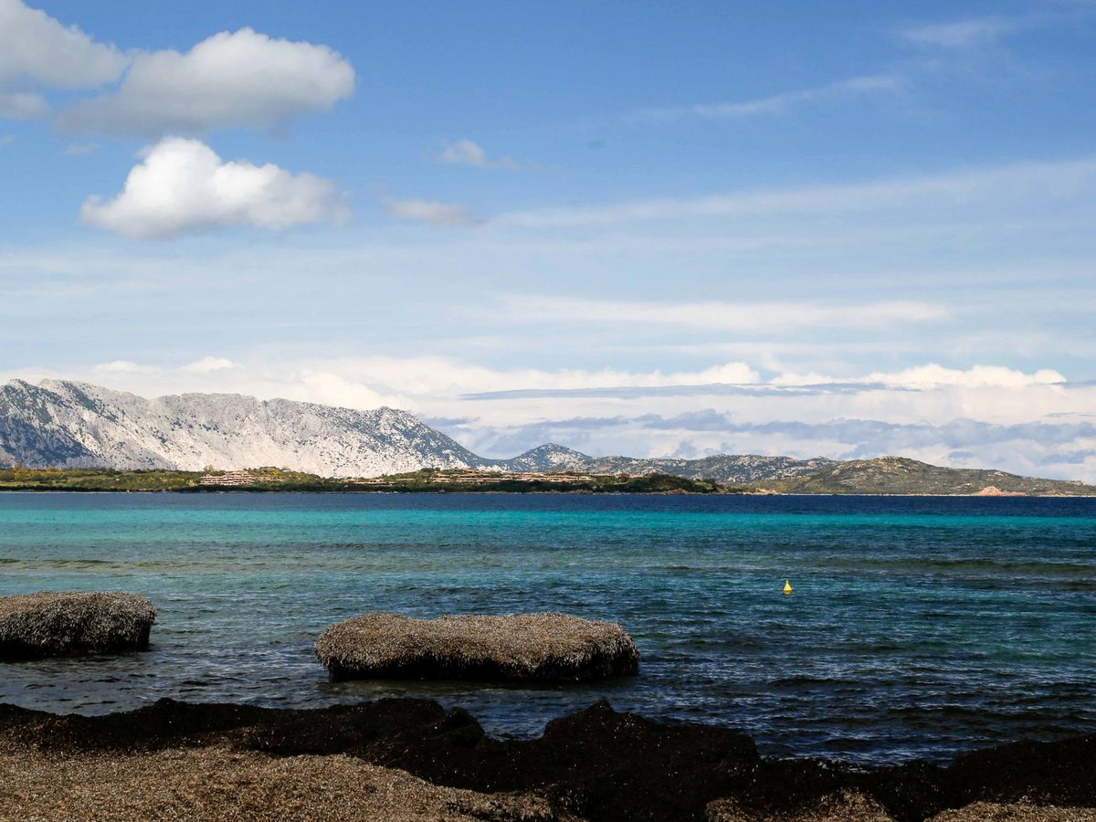 The beach at San Teodoro with Tavolara island across the water