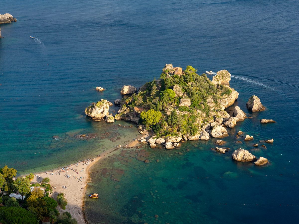 Isola Bella and its narrow causeway below Taormina