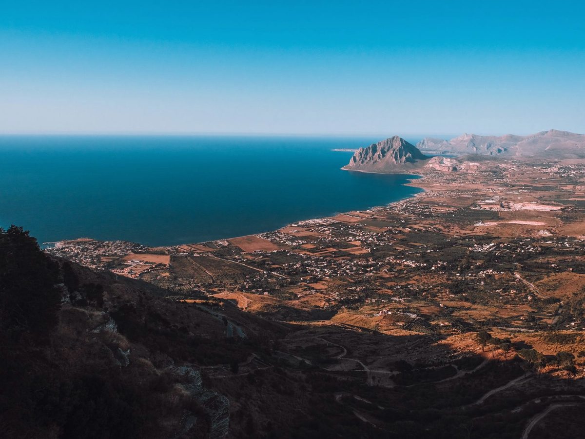 San Vito Lo Capo's white sand and flat turquoise water from above
